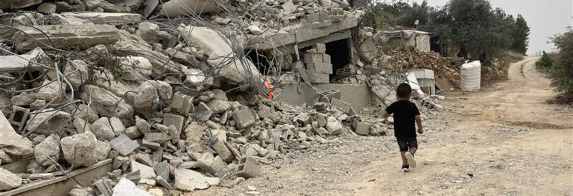 One of 10 children displaced after Israeli forces demolished their homes in Ni‘lin, central West Bank, on 21 April 2025. Photo by OCHA 